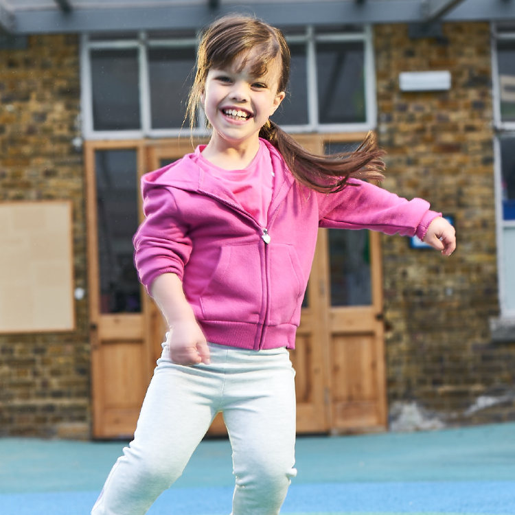 A girl dancing happily