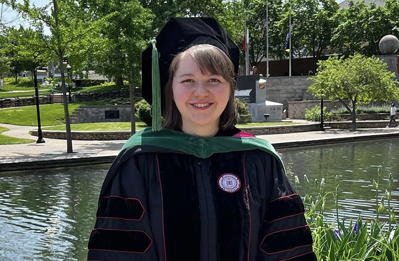 RARE Scholars program alum Olivia Cummings in graduation cap and gown