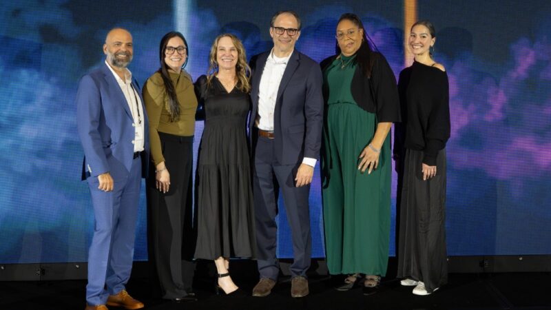 Image of group of employees smiling